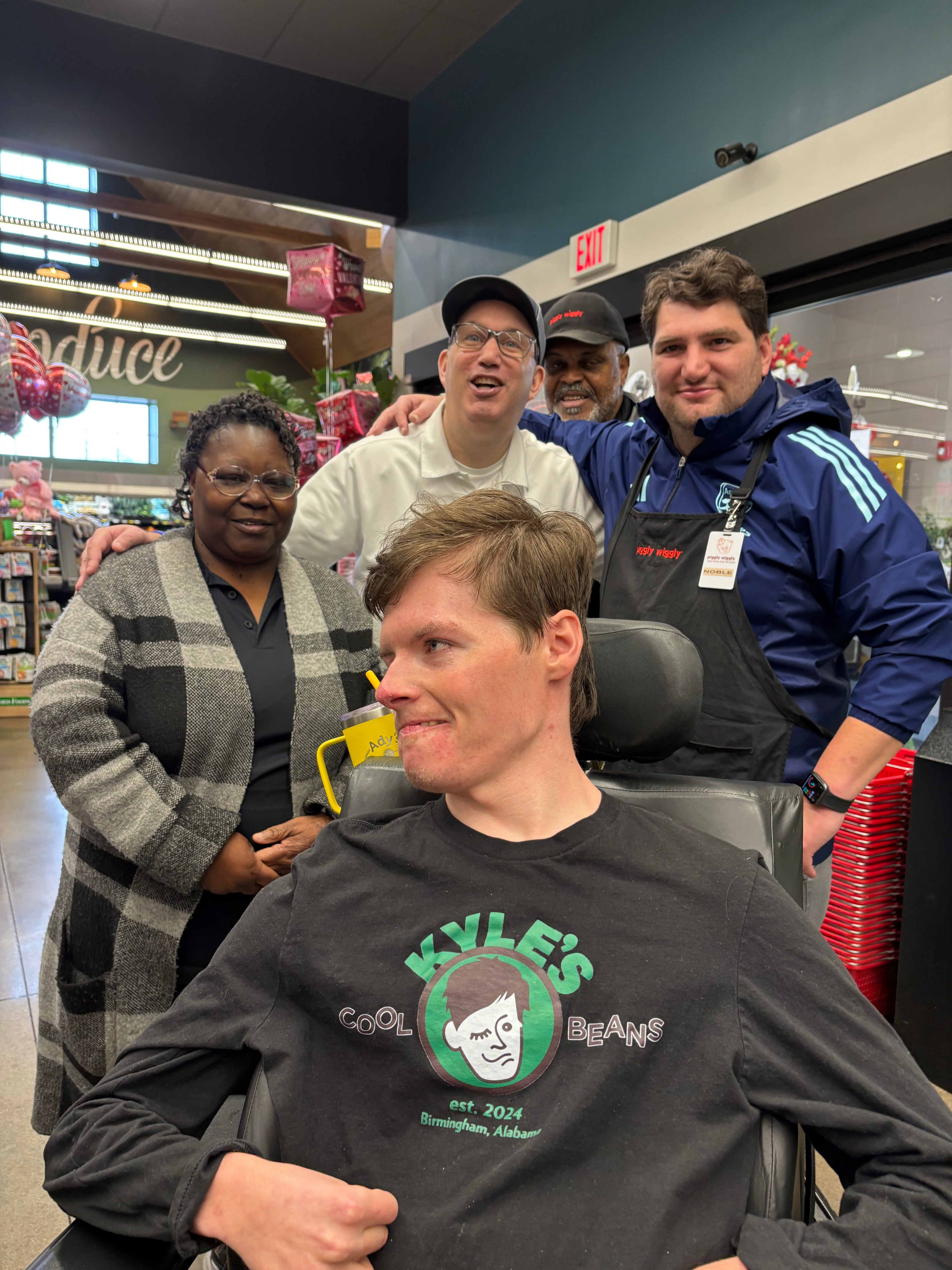 Kyle with four Piggly Wiggly Employee’s all are happy and smiling about the launch of Kyle’s Coffee at the store